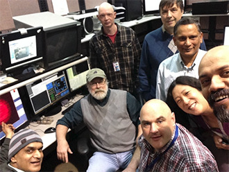 Members of the Northeastern Collaborative Access Team celebrate the successful recording of the first diffraction image from the new EIGER PAD.
