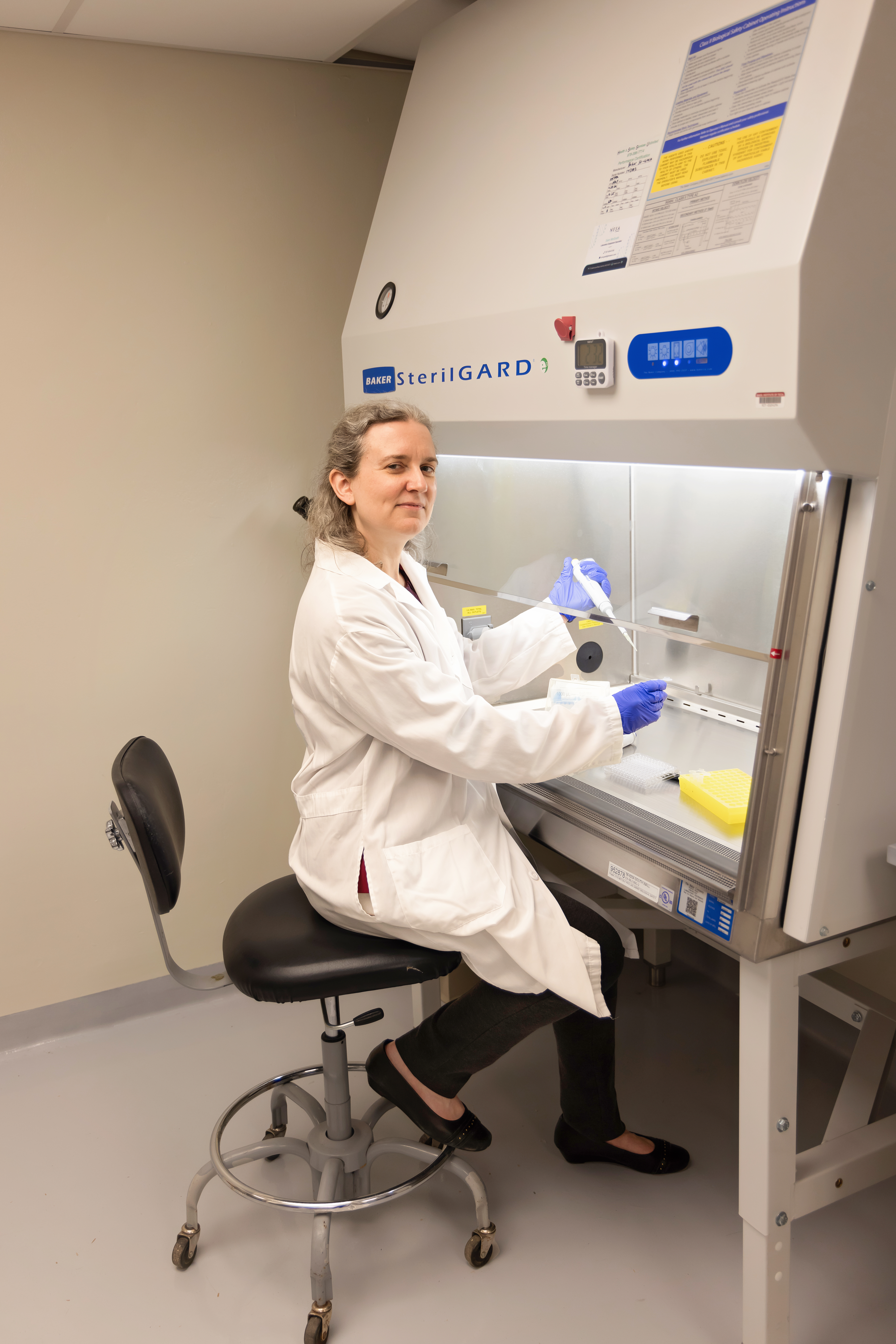 Kelly A. Metcalf Pate working in the laboratory.
