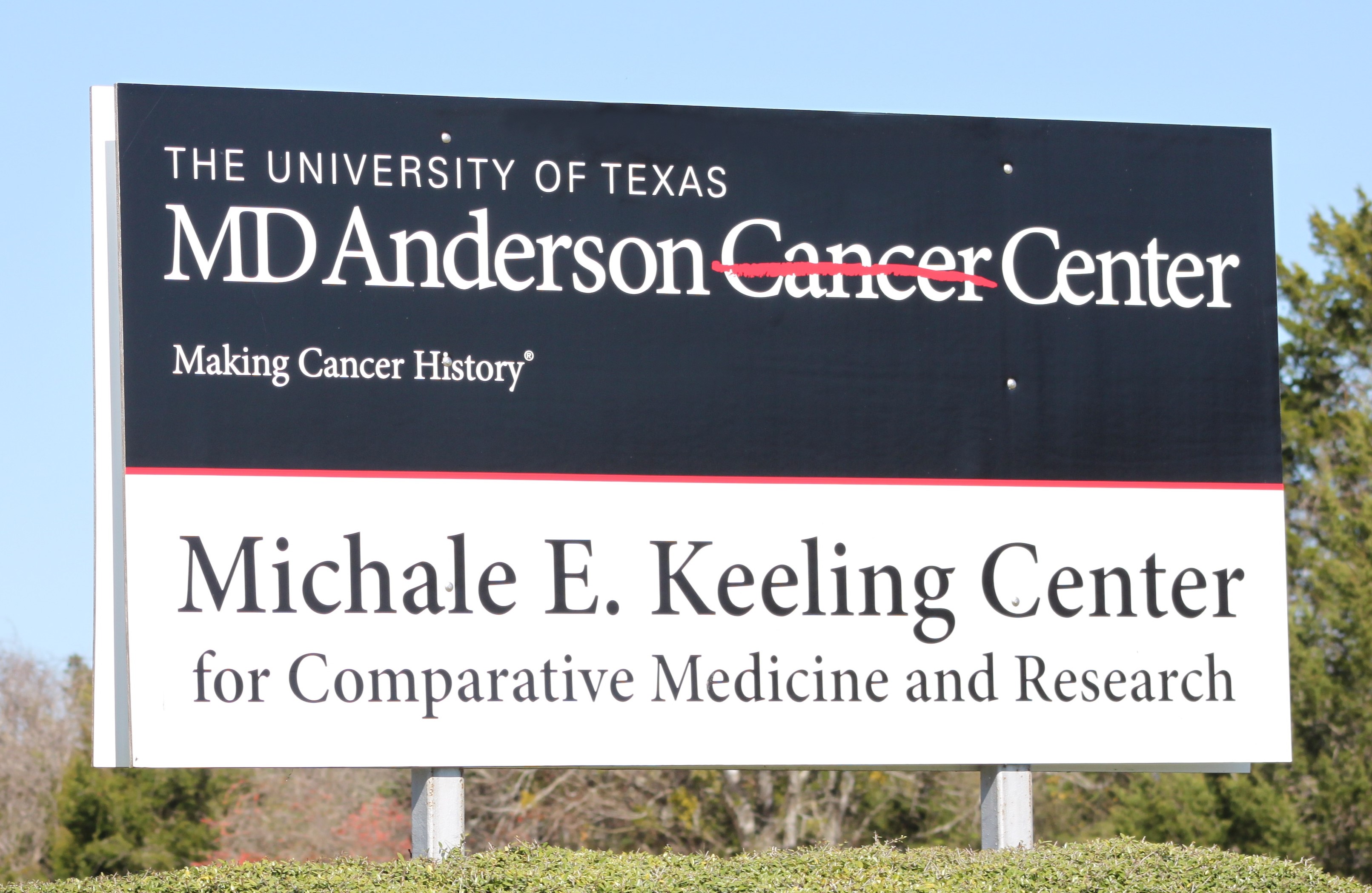 Front gate sign. The University of Texas. MD Anderson Cancer Center. Making Cancer History, Michale E. Keeling Center for Comparative Medicine and Research. 