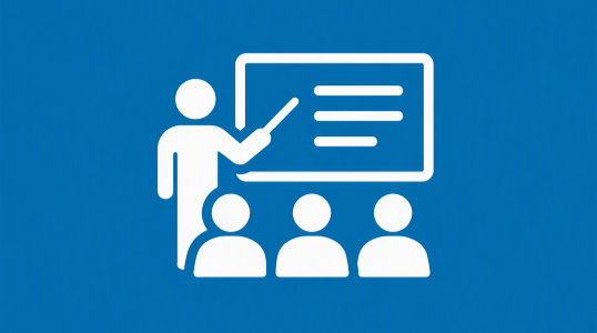 Icon depicting a presenter standing beside a training screen with an audience.