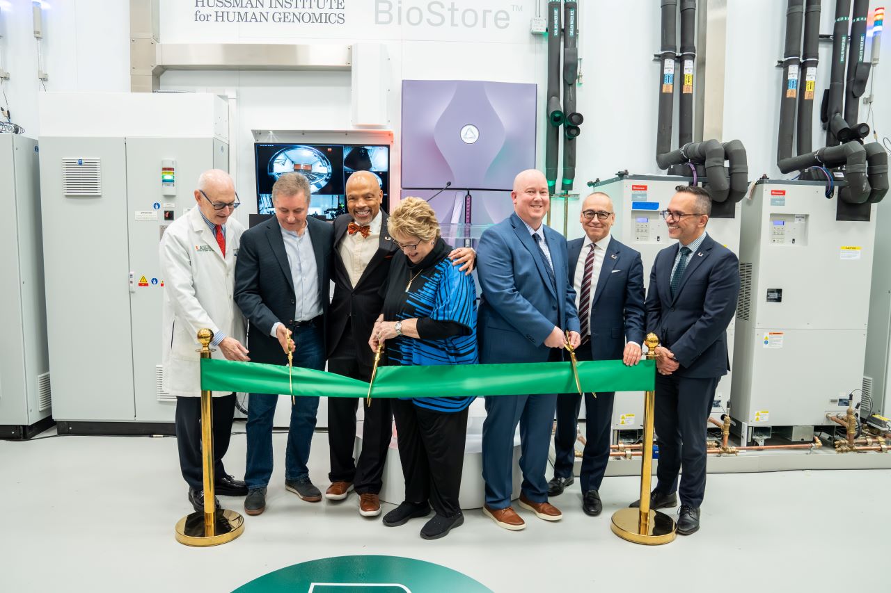 Figure 2: University of Miami leaders cutting a ribbon to open the Biospecimen Facility. 